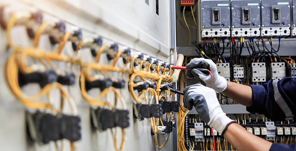 Professional Electrician technician working in Mesquite, TX